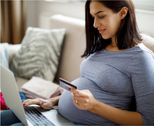 pregnant woman making online payment